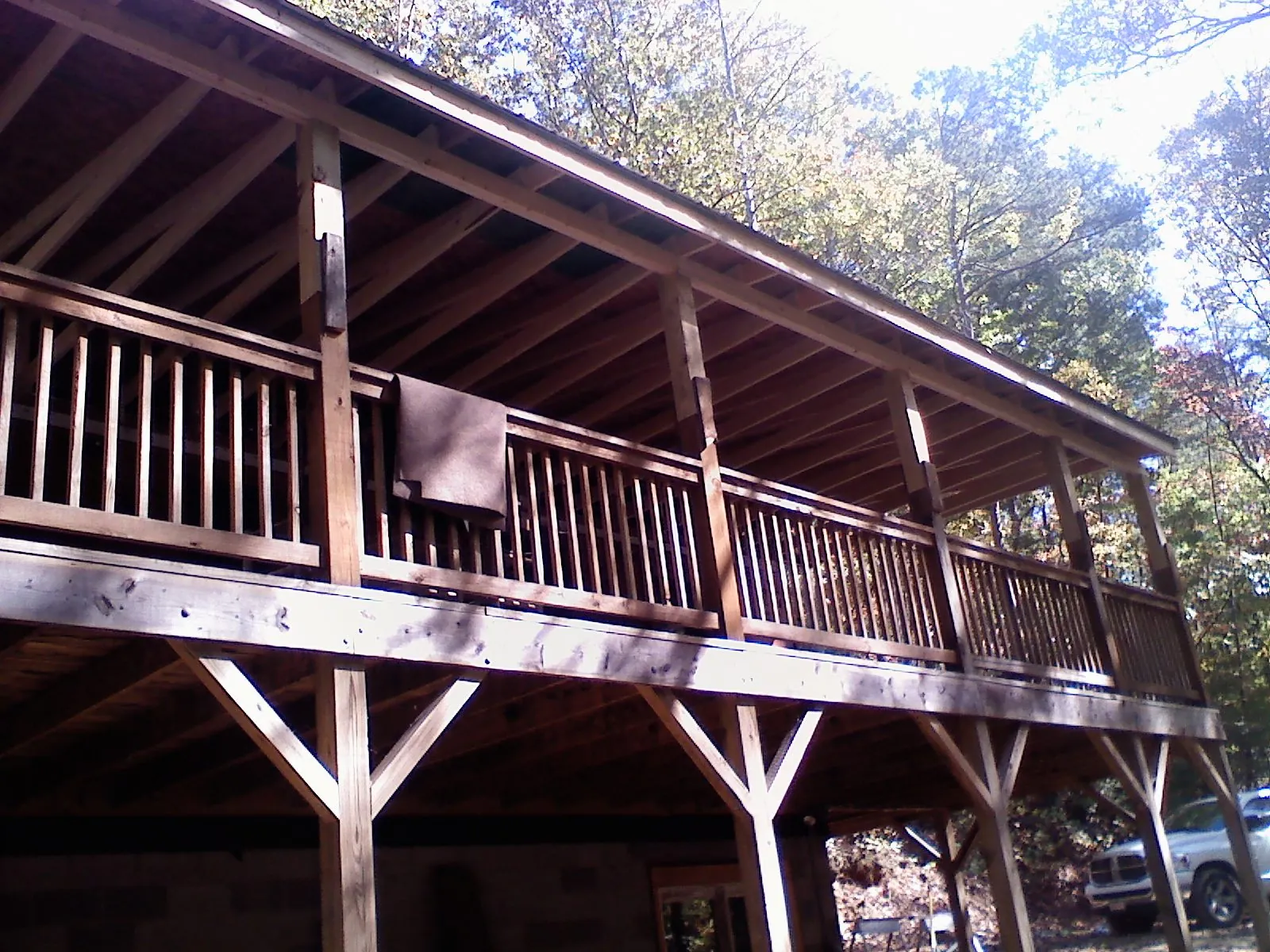 Timber framing under a new elevated porch and deck — Roof Leak Repair in Berrien Springs by Roofing Brothers